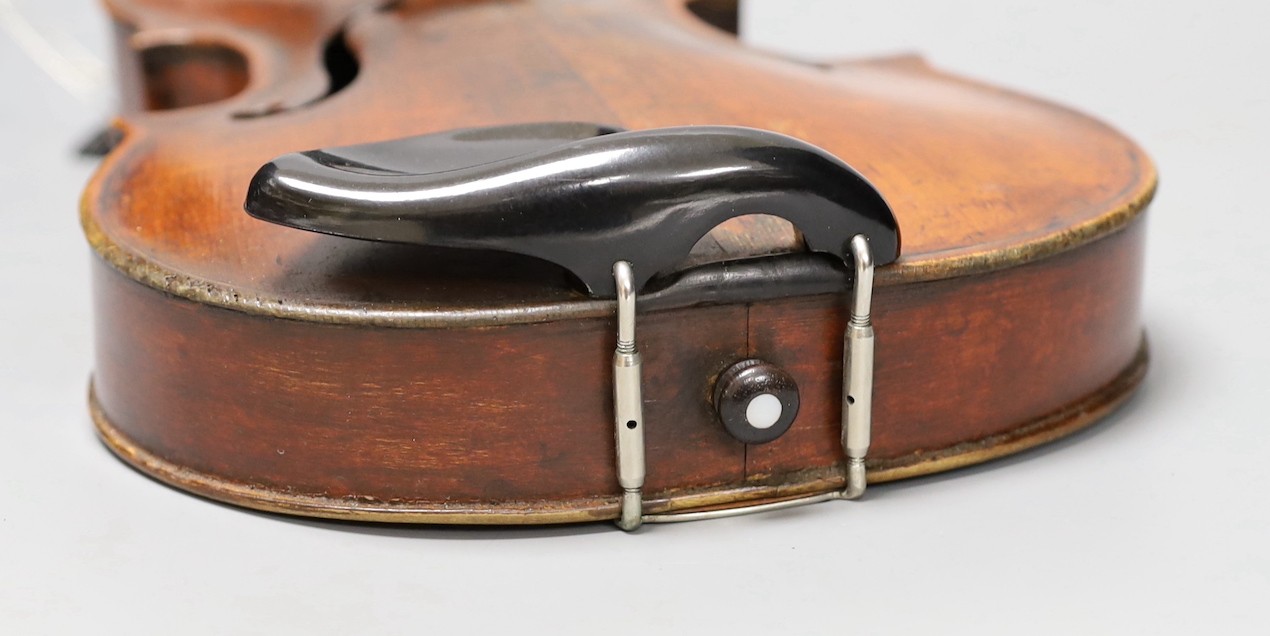 A violin labelled 'Albani Palermo', cased, length of back 35.5cm